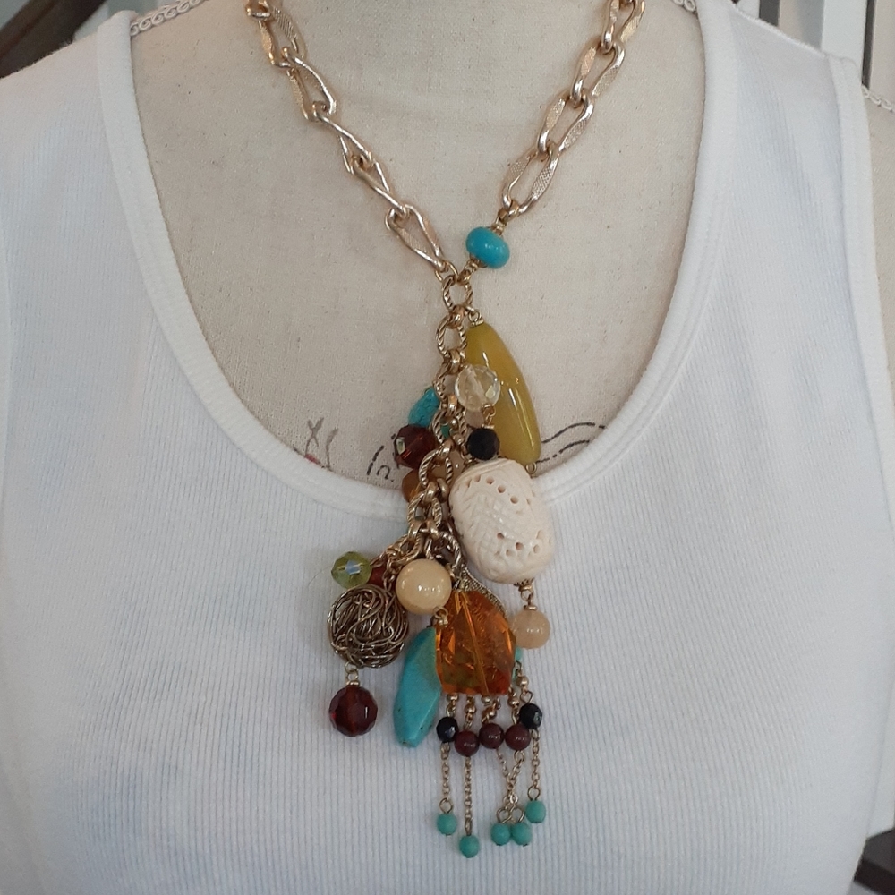 + Cascading charms statement necklace